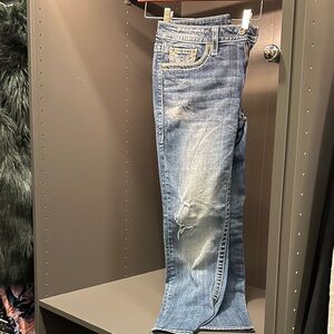 Distressed Blue Jeans